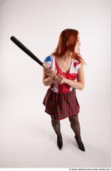 Woman Adult Average White Standing poses Casual Fighting with bat
